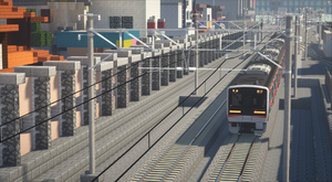 新鳥丘駅付近を走行中の2200系電車による急行列車(2018年)